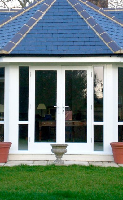 Pair of hardwood doors set within window sections