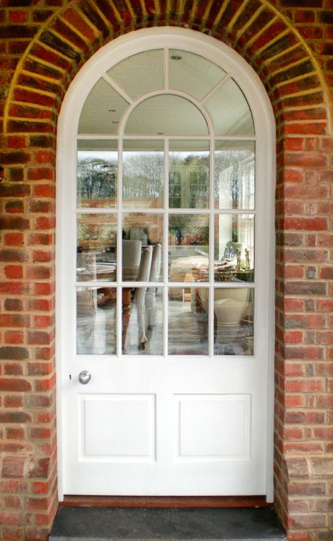 Hardwood painted door & frame, semi-circular headed