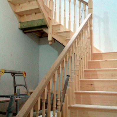 Cut string softwood staircase with oak handrail. Just fitted the day before into a private dwelling Cut string softwood staircase with oak handrail. Just fitted the day before into a private dwelling