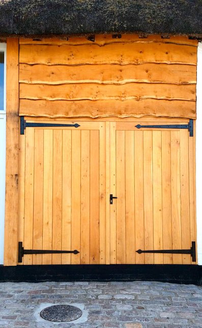 Pair of oak garage doors & frame Pair of oak garage doors & frame