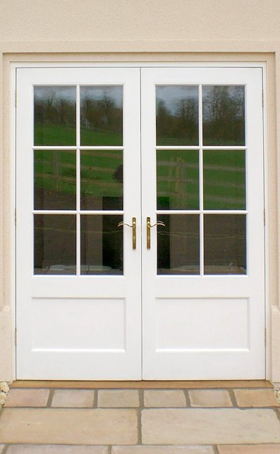 Pair of painted hardwood doors and frame Pair of painted hardwood doors and frame